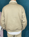 Collection Hiver 2024: Veste R Phare écoresponsable col sherpa unisexe Wet Sand
